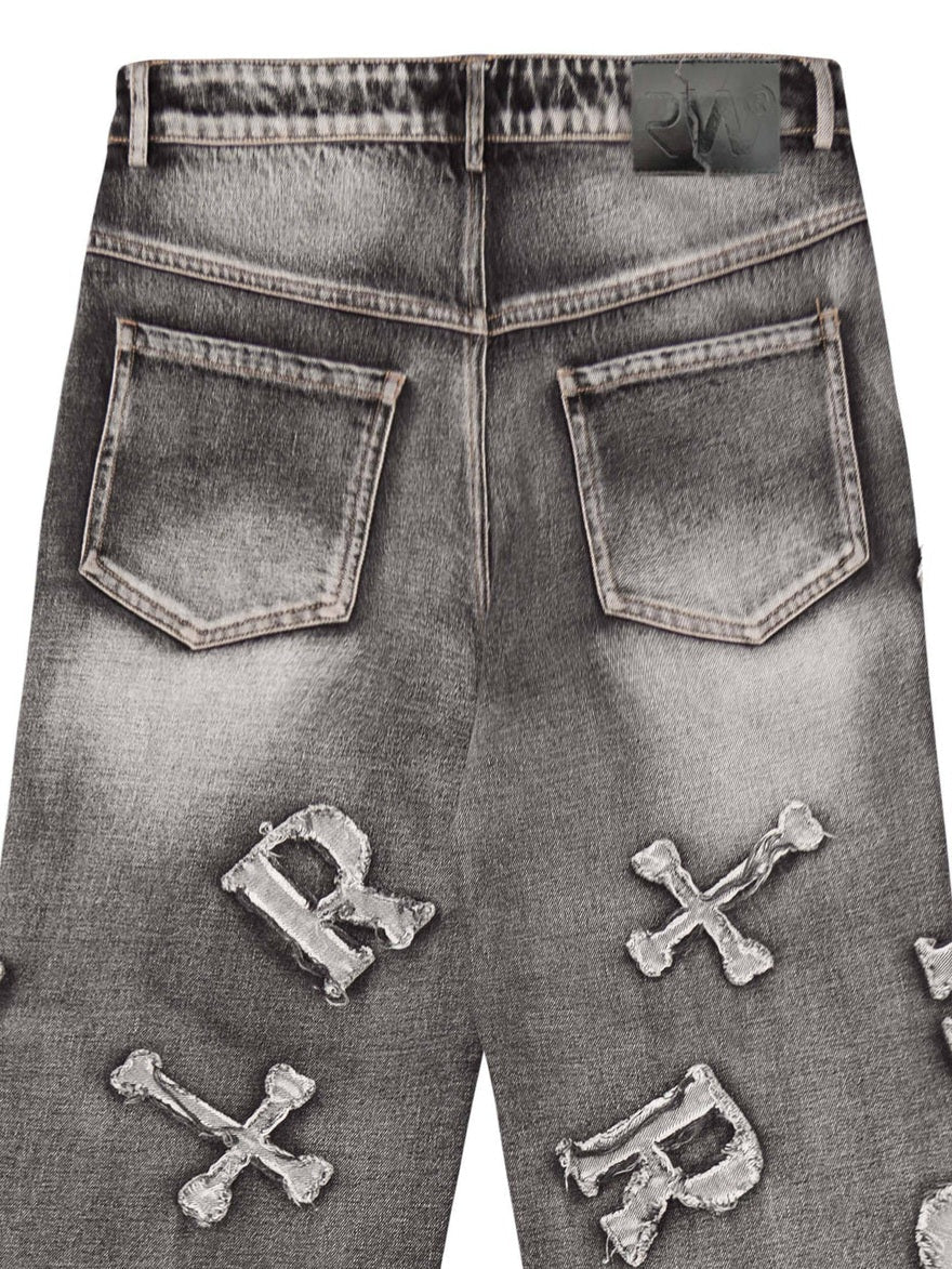 Frayed Cross & Letter Patch Jeans